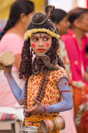 RISHIKESH, INDIA - OCTOBER 21: Unidentified girl dressed as Kumari at Dussehra festival celebration on October 21, 2012 in Rishikesh, India.のeditorial素材