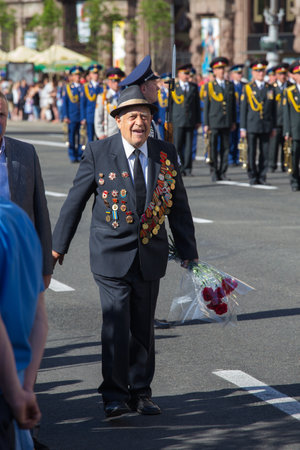 UKRAINE, KIEV - MAY 9: Ceremonial parade at Kiev main street - Khreschatyk - dedicated to the 68th Anniversary of victory in Great Patriotic War (World War II). Parade of victory on May 9, 2013 in Kiev, Ukraine.のeditorial素材