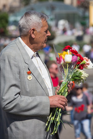 UKRAINE, KIEV - MAY 9: Ceremonial parade at Kiev main street - Khreschatyk - dedicated to the 68th Anniversary of victory in Great Patriotic War (World War II). Parade of victory on May 9, 2013 in Kiev, Ukraine.のeditorial素材