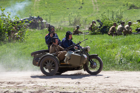 KIEV, UKRAINE - MAY 11 : Members of Red Star history club wear historical Soviet uniform during historical reenactment of WWII on May 11, 20113 in Kiev, Ukraineのeditorial素材