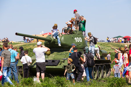 KIEV, UKRAINE - MAY 11 : Unknown ukrainian audience came to see  historical reenactment of WWII on May 11, 20113 in Kiev, Ukraineのeditorial素材