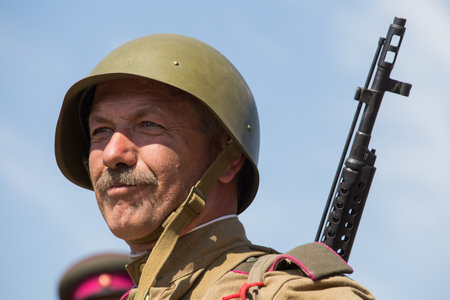 KIEV, UKRAINE - MAY 11 : Member of Red Star history club wear historical Soviet uniform during...