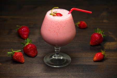 Strawberry milk cocktail on the tableの写真素材