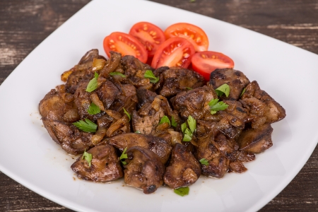 Chicken livers in a creamy sauce with onionの写真素材