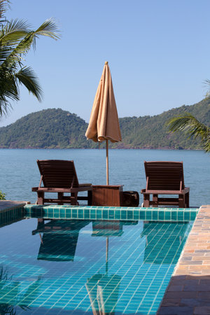 Swimming pool near the sea in island Koh Chang ,Thailandのeditorial素材