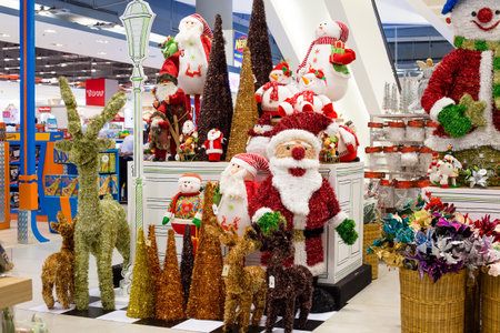 BANGKOK - NOVEMBER 19: Rows of Christmas toys in the supermarket Siam Paragon on Nov 19, 2013 in Bangkok, Thailand. Siam Paragon is a one of the biggest shopping centres in Asia.のeditorial素材