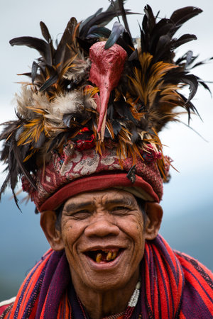 BANAUE - JANUARY 24   Unknown old ifugao man in national dress next to rice terraces on January 24,...