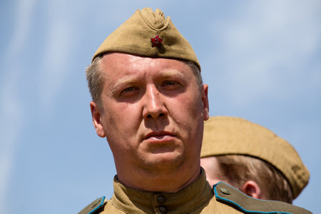 KIEV, UKRAINE - MAY 11 : Member of Red Star history club wear historical Soviet uniform during historical reenactment of WWII on May 11, 20113 in Kiev, Ukraineのeditorial素材