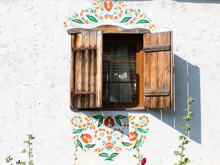 Detail of a window of a typical ukrainian antique house, in Pirogovo near Kievの写真素材