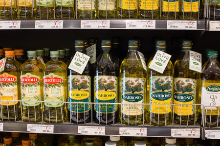 BANGKOK,THAILAND - NOVEMBER 19, 2013:Selection of olive oil on the shelves in a supermarket Siam Paragon. With 300,000 sqm of retail space Siam Paragon is one of the world's largest mallsのeditorial素材