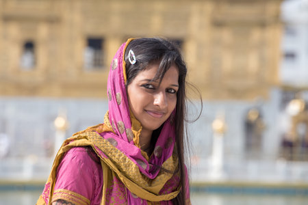 AMRITSAR, INDIA - SEPTEMBER 29, 2014: Unidentified Rajasthani woman visiting the Golden Temple in...