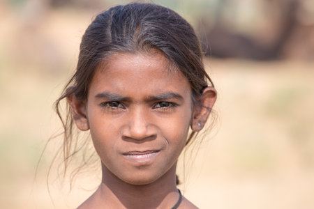 PUSHKAR, INDIA - OCTOBER 26, 2014: Unidentified girl at the attended the annual Pushkar Camel Mela....