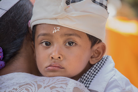 UBUD, BALI, INDONESIA - MARCH 25, 2015 : Unknown Indonesian young boy during the celebration...