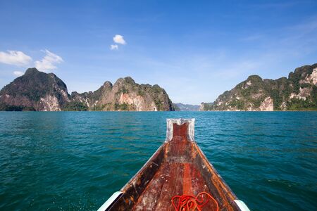 View sitting in a boat travel in lake at Khao Sok National Park, Surat Thani, Thailand.