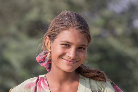 PUSHKAR, INDIA - OCTOBER 27, 2014: Unidentified girl at the attended the annual Pushkar Camel Mela. This fair is the largest camel trading fair in the world.のeditorial素材