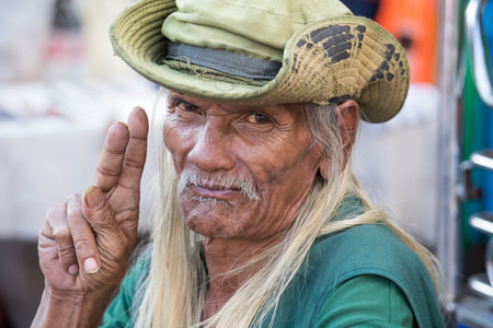 BANGKOK, THAILAND - JANUARY 21, 2015: An unidentified man living in a poor district of Bangkok Klong...