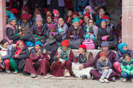 LAMAYURU, INDIA - JUNE 14, 2015: Unidentified buddhist old people during Tsam mystery in time of Yuru Kabgyat festival at Lamayuru Gompa, Ladakh, North Indiaのeditorial素材