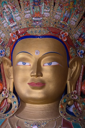 Close up colorful sculpture of Maitreya buddha at Thiksey Monastery, Tibetan Buddhist monastery in...