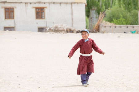 LEH, INDIA - JUNE 24, 2015: Unidentified Tibetan students in a lesson on Sport in Druk White Lotus Schoolのeditorial素材