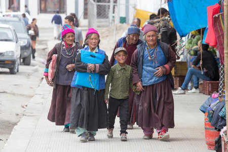 LEH, INDIA - JUNE 29, 2015 : Unidentified tibetan buddhist old women and boy on the streets in Ladakh, North Indiaのeditorial素材