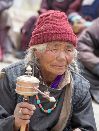 LAMAYURU, INDIA - JUNE 13, 2015: Unidentified buddhist old women during Tsam mystery in time of Yuru...