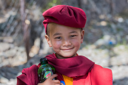 HEMIS, INDIA - JUNE 27, 2015 : Unidentified buddhist young monk during Hemis Festival at Ladakh, North Indiaのeditorial素材