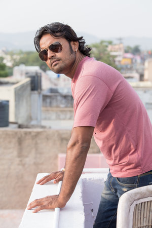 PUSHKAR, INDIA - OCTOBER 28, 2014: Unidentified Indian man attended the annual Pushkar Camel Mela. This fair is the largest camel trading fair in the world.のeditorial素材