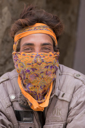 LEH, INDIA - JUNE 21, 2015: Unidentified beggar man on the street in Leh, Ladakh. Poverty is a major issue in Indiaのeditorial素材