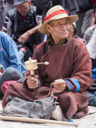 HEMIS, INDIA - JUNE 27, 2015: Unidentified tibetan buddhist old man during Hemis Festival at Ladakh, North Indiaのeditorial素材