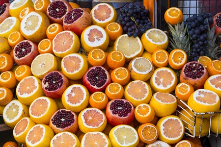 Ripe oranges and grenades for receiving freshly squeezed juice for sale in the street of Istanbul....