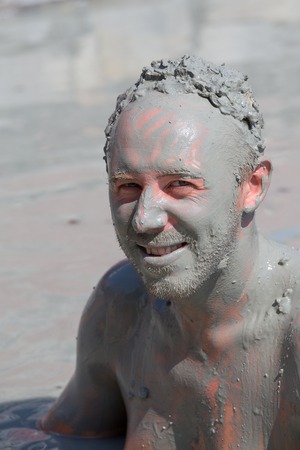 Portrait of a man who takes a mud bath. Dalyan, Turkeyの写真素材