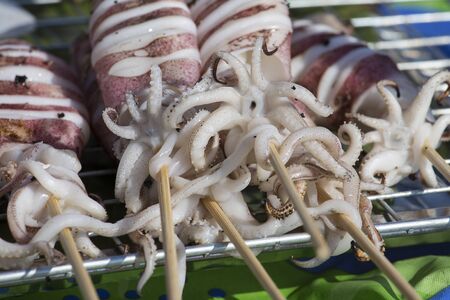 Grilled squid on the market in Thailand. Close upの写真素材