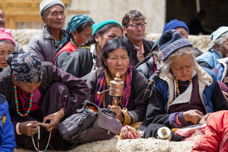 LAMAYURU, INDIA - JUNE 13, 2015: Unidentified buddhist old people during mystical mask dancing Tsam mystery dance in time of Yuru Kabgyat Buddhist festival at Lamayuru Gompa, Ladakh, North Indiaのeditorial素材