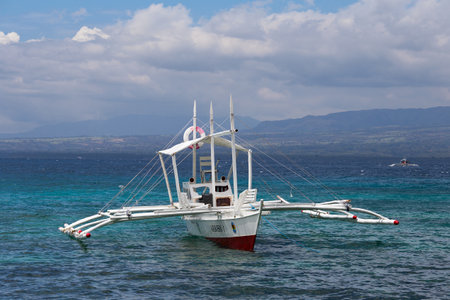 EL NIDO, PHILIPPINES - FEBRUARY 14, 2014 : Boats waiting for tourists to travel between the islands. El Nido is one of the top tourist destinations in the world.のeditorial素材