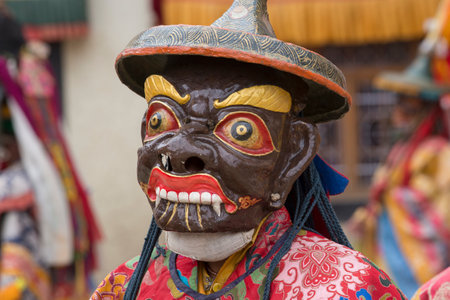 LAMAYURU, INDIA - JUNE 13, 2015: An unidentified buddhist lamas dressed in mystical mask dancing Tsam mystery dance in time of Yuru Kabgyat Buddhist festival at Lamayuru Gompa, Ladakh, North Indiaのeditorial素材