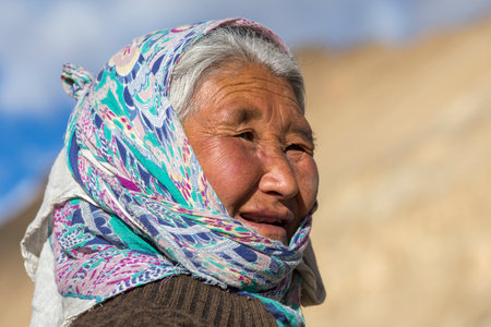 LADAKH, INDIA - SEPTEMBER 09, 2014: Old unidentified local woman, outdoor in Ladakh. The majority of the local population are descendant of Tibetan.のeditorial素材