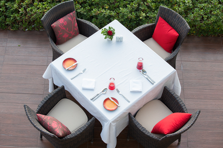 Table and chairs in empty cafe next the beach, top view. Island Koh Samui, Thailandの写真素材