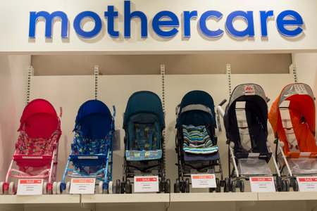 BANGKOK, THAILAND - JANUARY 7, 2016 : Section of baby carriages Mothercare in supermarket Siam Paragon. Siam Paragon is a one of the biggest shopping centres in Asia.のeditorial素材