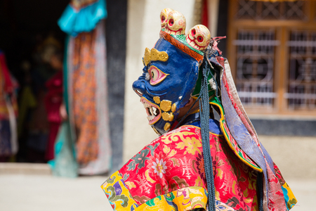 LAMAYURU, INDIA - JUNE 13, 2015: Unidentified buddhist lamas dressed in mystical mask dancing Tsam mystery dance in time of Yuru Kabgyat Buddhist festival at Lamayuru Gompa, Ladakh, North Indiaのeditorial素材