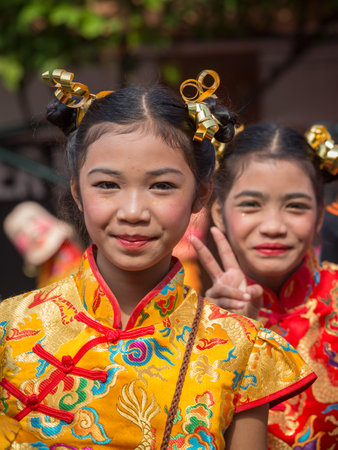 BANGKOK, THAILAND - FEBRUARY 09, 2016 : Unknown young Thai girls during the celebration of Chinese New Year and Valentine's Day in Yaowarat street, Chinatownのeditorial素材