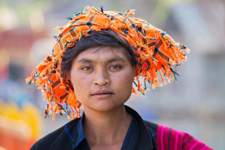 INLE LAKE, MYANMAR - JANUARY 13, 2016: Unidentified woman in market. The local people are hospitable and friendly to touristsのeditorial素材