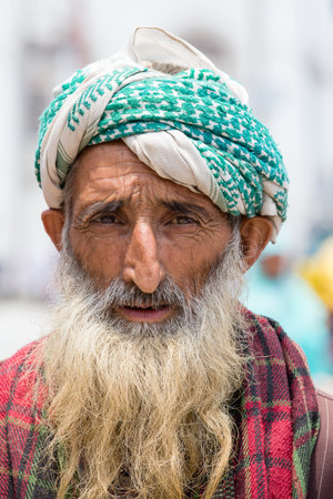 SRINAGAR, INDIA - JUNE 11, 2015: Unidentified Indian muslim man in the street marketのeditorial素材
