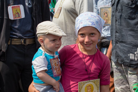 KIEV, UKRAINE - JULY 27, 2016 : Children and parishioners Ukrainian Orthodox Church Moscow Patriarchate in religious procession. At present there is war of Kiev Patriarchate and Moscow Patriarchateのeditorial素材