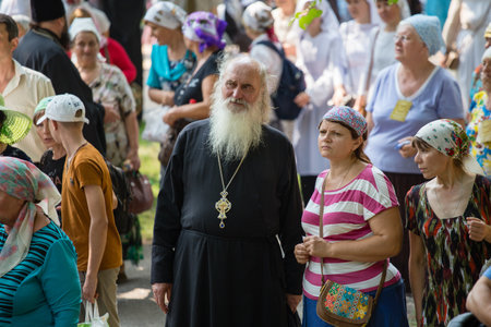 KIEV, UKRAINE - JULY 27, 2016 : Parishioners Ukrainian Orthodox Church Moscow Patriarchate during religious procession. At present there is undeclared war of Kiev Patriarchate and Moscow Patriarchateのeditorial素材