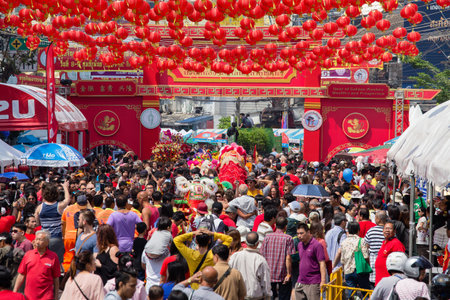 BANGKOK, THAILAND - FEBRUARY 08, 2016 : A crowd of people roams the street of Yaowarat during the celebration of Chinese New Year and Valentine's Day. Yaowarat is a Chinatown situated in Bangkok.のeditorial素材