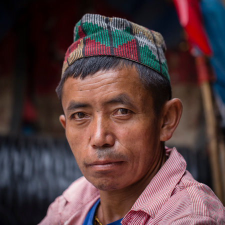 POKHARA, NEPAL - SEPTEMBER 29, 2016 : Portrait old men in traditional dress in street Pokhara, Nepalのeditorial素材