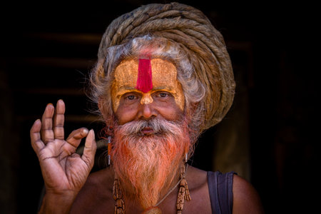 KATHMANDU, NEPAL - OCTOBER 25, 2016 : Portrait of Shaiva sadhu, holy man in Pashupatinath Temple . Close upのeditorial素材