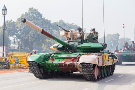NEW DELHI, INDIA - JANUARY 23, 2017 : Battle Tank and military men take part in rehearsal activities for the upcoming India Republic Day parade. New Delhi, Indiaのeditorial素材