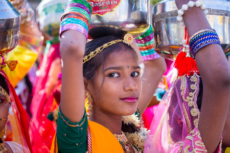 JAISALMER, INDIA - FEBRUARY 08, 2017 : Indian girl wearing traditional Rajasthani dress participate in Desert Festival in Jaisalmer, Rajasthan, Indiaのeditorial素材