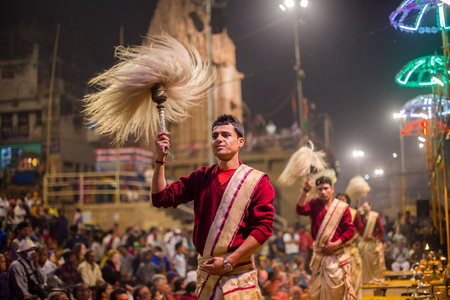VARANASI, INDIA - JANUARY 25, 2017 : Unidentified Hindu priest at the religious Ganga Aarti ritual,...